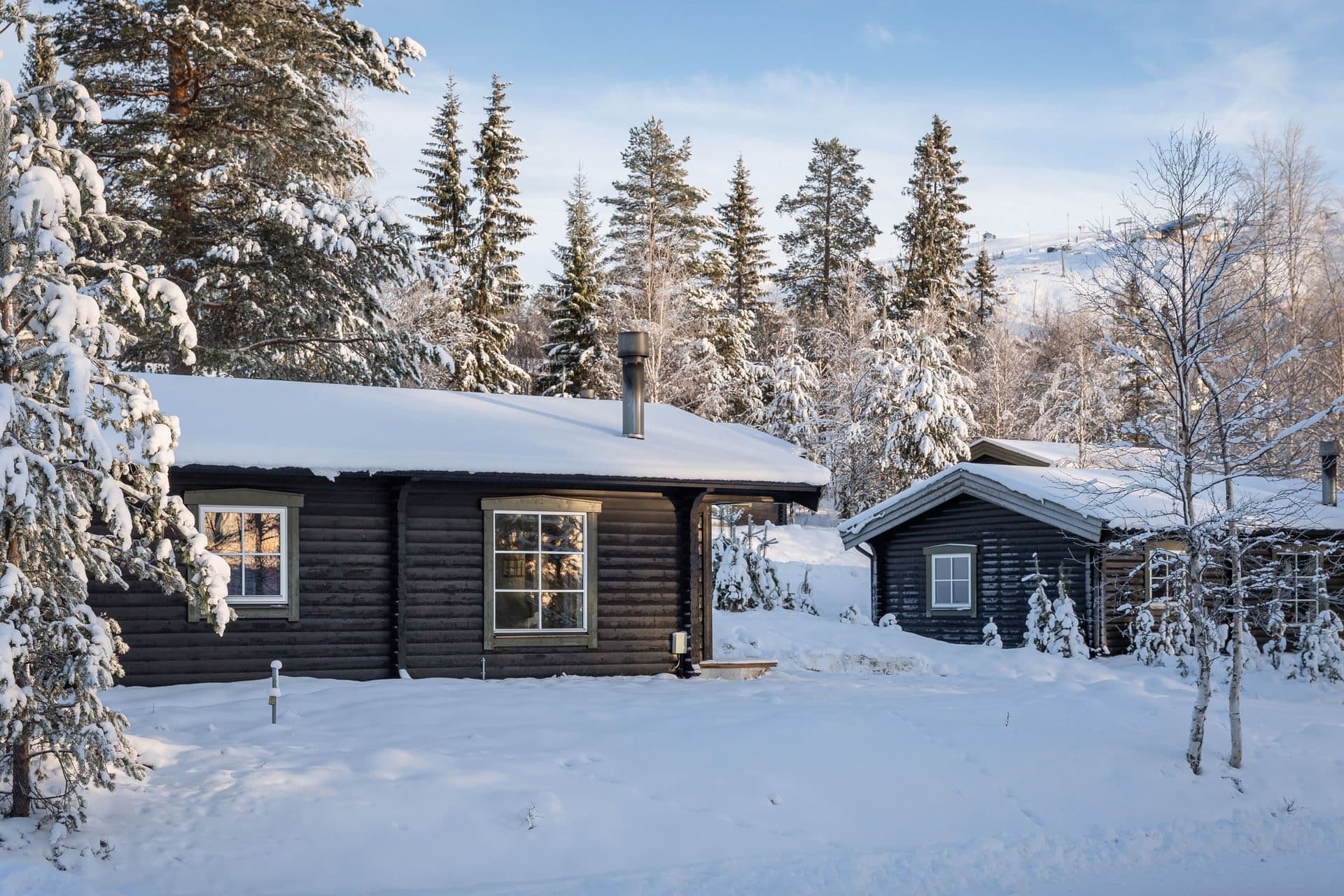 Huset i omgivning till andra hus